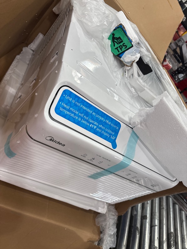 Photo 1 of Midea 12,000 BTU Smart Inverter Air Conditioner Window Unit with Heat and Dehumidifier – Cools up to 550 Sq. Ft., Energy Star Rated, Quiet Operation, Electronic Controls, Remote Control, White