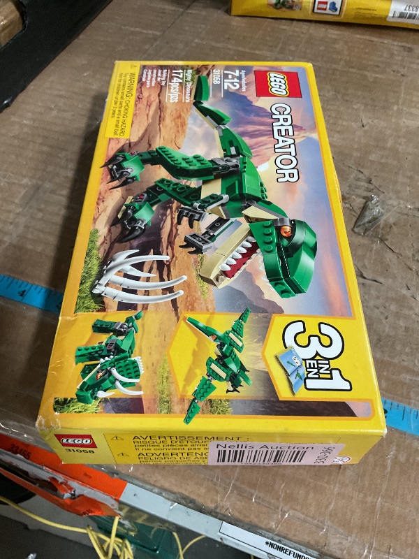 Photo 1 of *FACTORY SEALED*
LEGO Creator 3 in 1 Mighty Dinosaur Toy, Transforms from T. rex to Triceratops to Pterodactyl Dinosaur Figures, Great Gift for 7-12 Year Old Boys & Girls, 31058