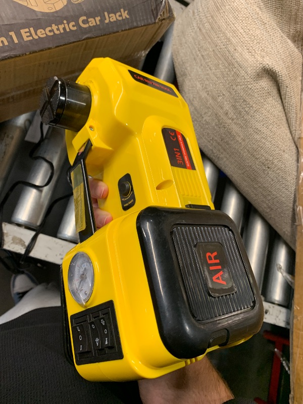 Photo 1 of (missing accessories) (unable to test total functionality) (used/fair) VIVOHOME Electric Car Jack 5 Ton 12V, 3 in 1 Hydraulic Floor Jack 6.1"-20.9" Lifting Range, Portable Emergency Car Lift with Tire Inflator for SUV MPV Truck