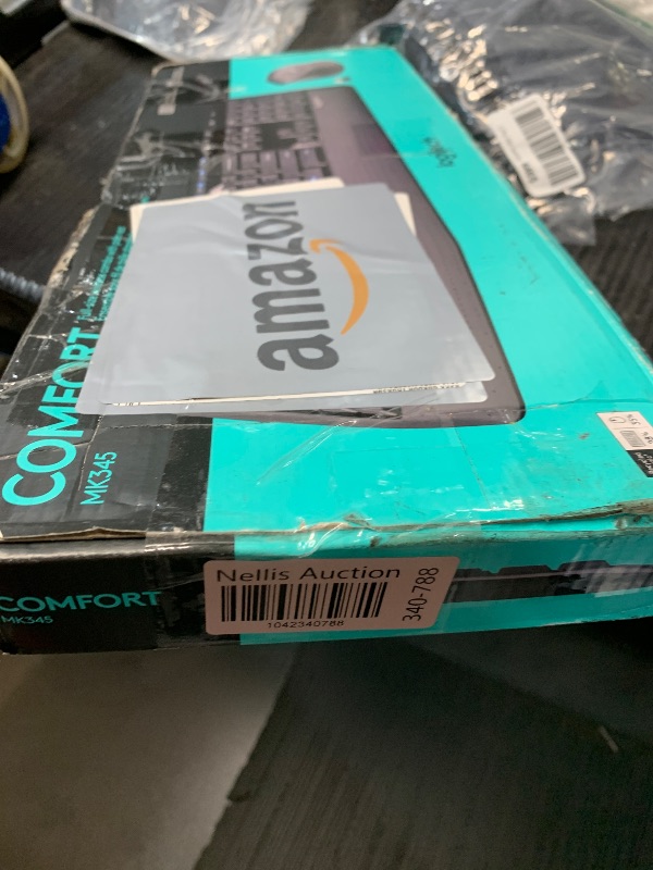 Photo 1 of Logitech MK345 Wireless Combo Full-Sized Keyboard with Palm Rest and Comfortable Right-Handed Mouse, 2.4 GHz Wireless USB Receiver, Compatible with PC, Laptop,Black