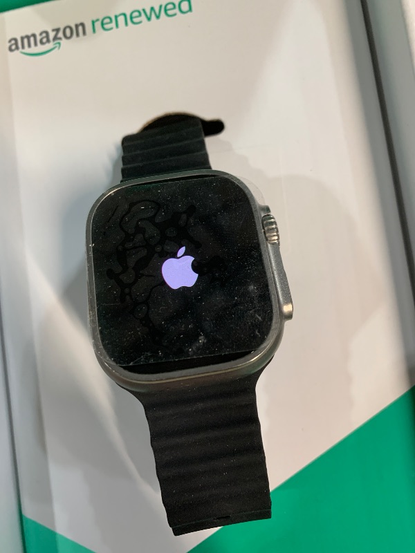Photo 1 of (LOCKED TO PREVIOUS OWNER) (SIGNS OF USE) Apple Watch Ultra [GPS + Cellular 49mm] Titanium Case with Midnight Ocean Band, One Size (Renewed Premium)