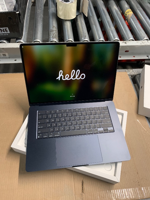Photo 1 of Apple 2023 MacBook Air Laptop with M2 chip: 15.3-inch Liquid Retina Display, 8GB Unified Memory, 256GB SSD Storage, 1080p FaceTime HD Camera, Touch ID. Works with iPhone/iPad; Midnight