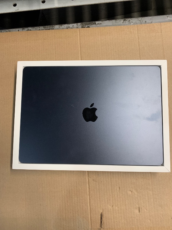 Photo 1 of Apple 2023 MacBook Air Laptop with M2 chip: 15.3-inch Liquid Retina Display, 8GB Unified Memory, 256GB SSD Storage, 1080p FaceTime HD Camera, Touch ID. Works with iPhone/iPad; Midnight