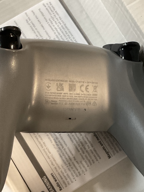 Photo 1 of ***(MINOR DAMAGE/ SEE NOTES)***
PlayStation DualSense® Wireless Controller - Gray Camouflage