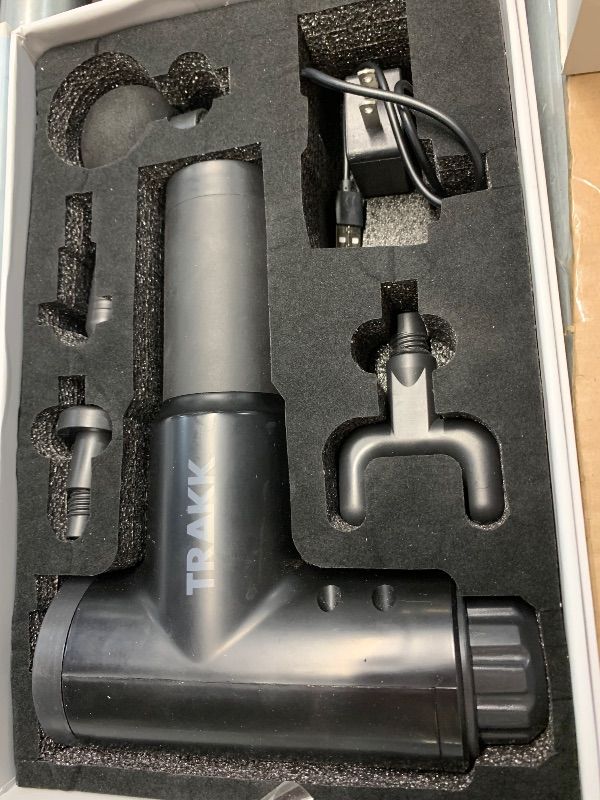 Photo 1 of **PARTS ONLY NON FUNCTIONAL, MISSING PARTS**
TRAKK Beast Deep Tissue Percussion Massage Gun, Rechargeable Handheld 6 Speed Cordless Massager, 4 Interchangeable Heads (Black)