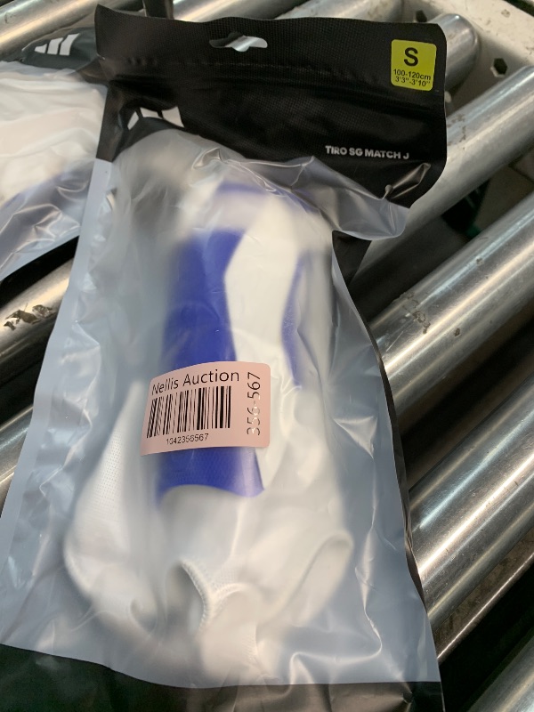 Photo 1 of adidas Unisex-Child Tiro Soft Ground Match Shin Guards, White/Team Royal Blue/White, Small