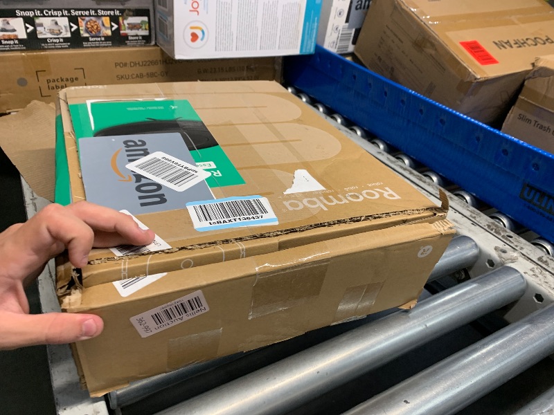 Photo 1 of (used) iRobot Roomba Vac Robot Vacuum (Q0120) - Easy to use, Power-Lifting Suction, Multi-Surface Cleaning, Smart Navigation Cleans in Neat Rows, Self-Charging, Alexa