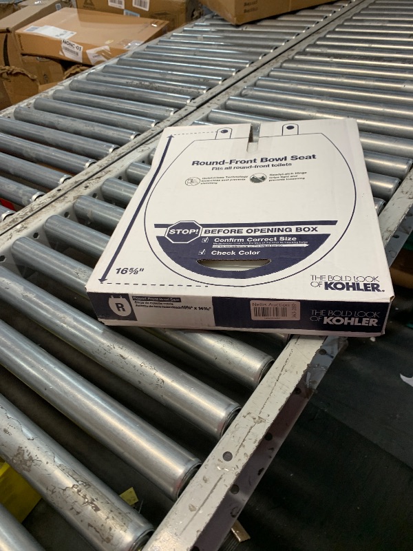 Photo 1 of *** FACTORY SEALED*** KOHLER 4639-RL-0 Cachet ReadyLatch Round-Front Toilet Seat, Quiet-Close Lid, Contoured Seat, Grip-Tight Bumpers and Installation Hardware, White