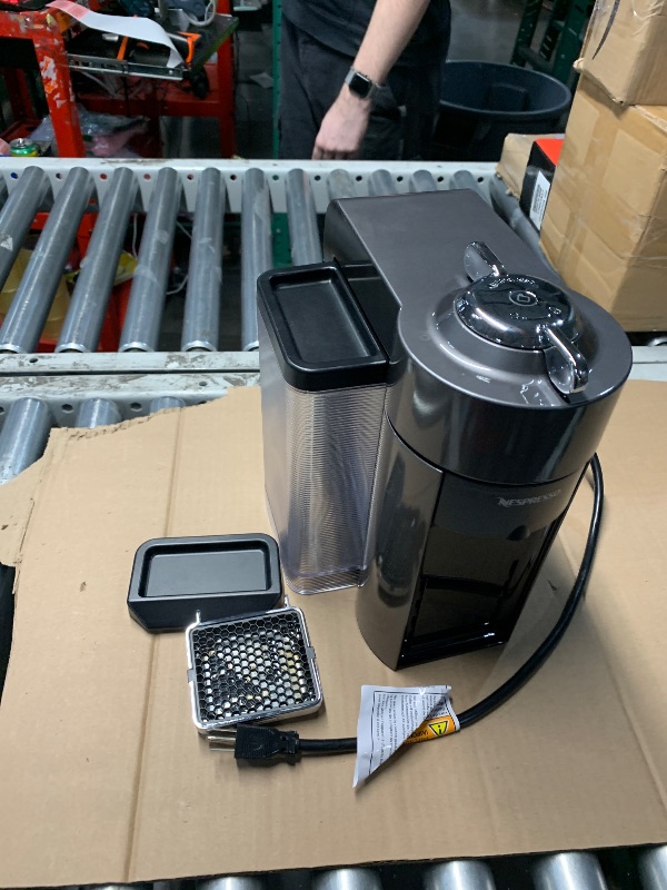 Photo 1 of **READ NOTES**(MISSING HARDWARE//COSMETICS)
Nespresso Vertuo Coffee and Espresso Maker,1597 ml, by De'Longhi, Graphite Metal