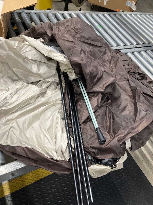 Photo 1 of **ONE OF THE LEGS IS BROKEN/PARTS ONLY**Brown and cream camping tent 