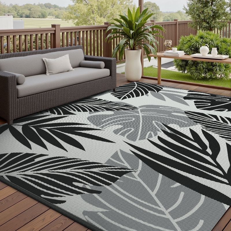 Photo 1 of  Outdoor Rug Carpet 8'x10' Waterproof Reversible Patio Rug Portable Indoor Outdoor Rug Plastic Straw Rug for Beach RV Camping Garden Picnic Deck Backyard Porch Decor Gray and Black