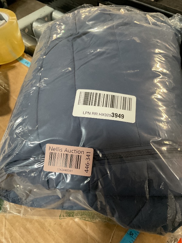Photo 1 of Amazon Essentials Men's Packable Lightweight Water-Resistant Puffer Jacket (Available in Big & Tall), Indigo, Large