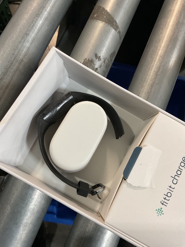 Photo 1 of **1OF THE WATCH BANDS IS HEAVILY DAMAGED**COMES WITH A NEW ONE **
Fitbit Charge 4 Black Advanced Fitness Tracker