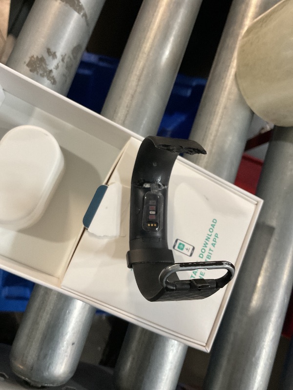 Photo 1 of **1OF THE WATCH BANDS IS HEAVILY DAMAGED**COMES WITH A NEW ONE **
Fitbit Charge 4 Black Advanced Fitness Tracker