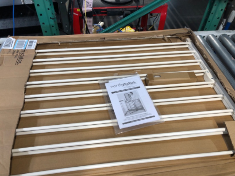 Photo 1 of *** OPENED FOR INSPECTION***
Toddleroo by North States Baby Gate for Stairs and Doorways: Tall Easy Swing & Lock Series 2 Child Gate, Fits Openings 28.68"-47.85" Wide. Safety Latch, Hardware Mount. (36" Tall, Warm White)