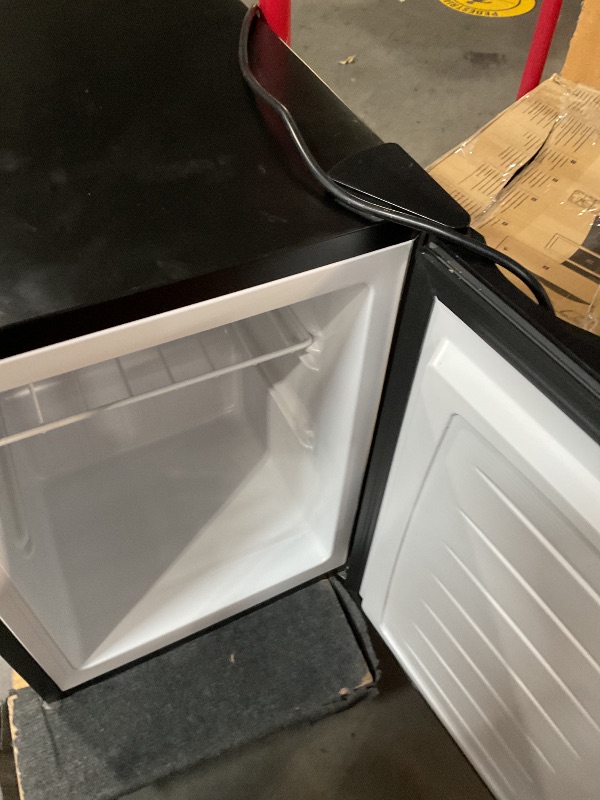 Photo 1 of **READ NOTES**(NEEDS TO BE CLEANED)-UNSURE OF FUNCTION
Electactic 2.1 Cu.ft Upright Freezer, Small Mini Freezer with Adjustable Thermostat, Removable Shelves, Reversible Single Door, for Bedroom/Home/Dorms/Apartment (Stainless Steel)