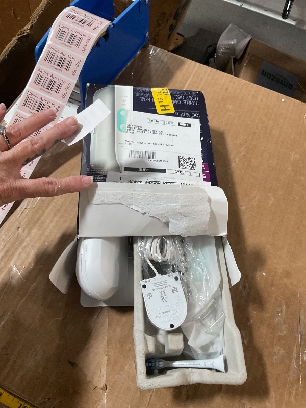 Photo 1 of Philips Sonicare ProtectiveClean 5100 Rechargeable Electric Toothbrush, with Pressure Sensor, 3 Cleaning Modes, SmarTimer and QuadPacer, 14-Day Battery Life, Travel Case, White, Model HX6857/11