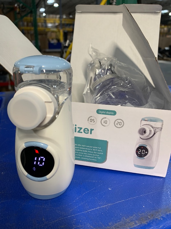 Photo 1 of Misty Nebulizer, Portable Nebulizer with Intuitive LED Interface and Auto-Cleaning, Handheld Nebulizer for Adults Kids