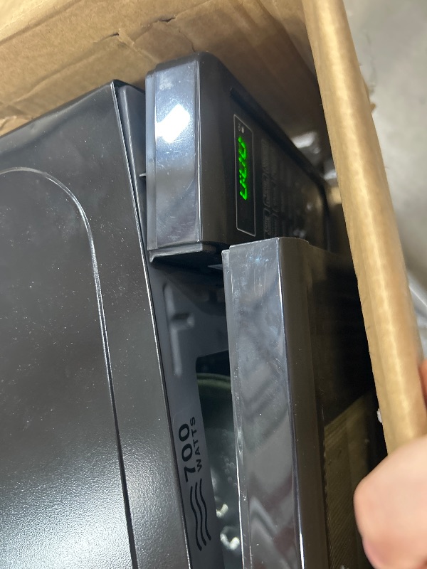Photo 1 of *** SEE NOTES ***Farberware Countertop Microwave 700 Watts, 0.7 Cu. Ft. - Microwave Oven With LED Lighting and Child Lock - Perfect for Apartments and Dorms - Easy Clean Grey Interior, Retro Black