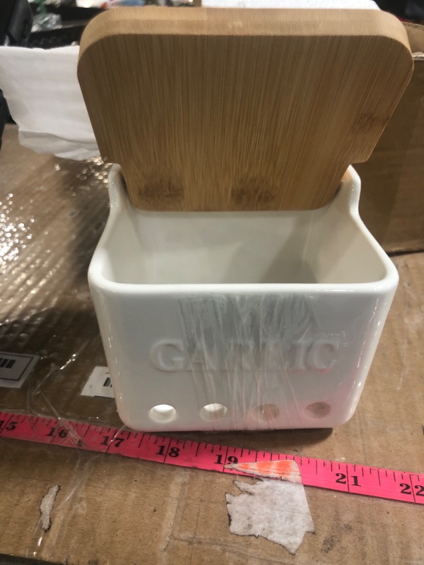 Photo 1 of (BAGGED) ONTUBE Garlic Keeper with Lid, Ceramic Garlic Holder Storage, Garlic Container for Kitchen, Garlic Saver to Keep Your Garlic Cloves Fresh Longer 4.7-Inch, White