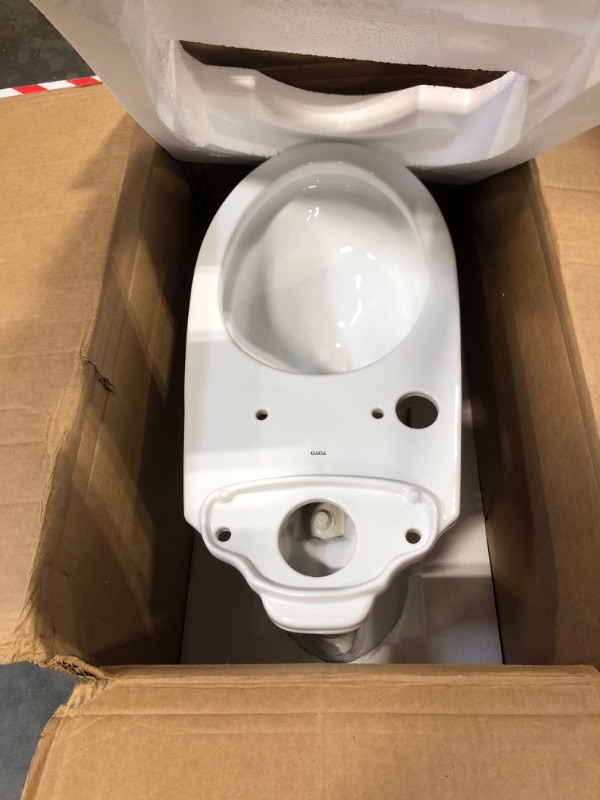 Photo 1 of **SEAT ONLY**TOTO Drake Two-Piece Elongated 1.28 GPF Universal Height TORNADO FLUSH Toilet with CEFIONTECT and Right-Hand Trip Lever, Cotton White 