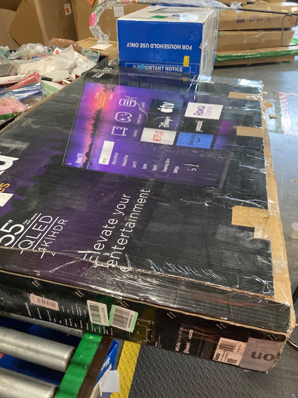 Photo 1 of **unable to get cover off tv so unable to test**Roku Smart TV – 55-Inch Pro Series 4K QLED RokuTV with Backlit Roku Voice Remote Pro, Dolby Vision IQ, 120Hz Refresh Rate – Live Local News, Sports, Gaming