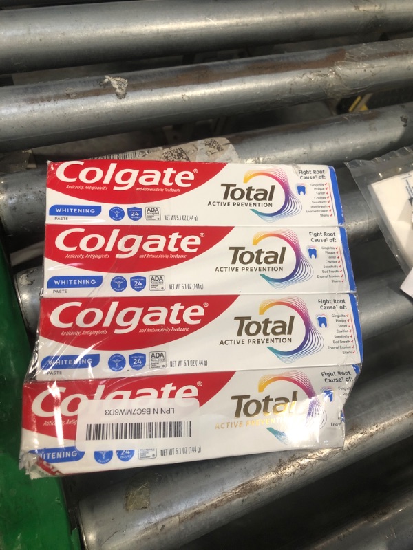 Photo 1 of Colgate Total Whitening Toothpaste with Fluoride, 10 Benefits Including Sensitivity Relief and Stain Removal, Mint, 5.1 ounces (4 Pack)