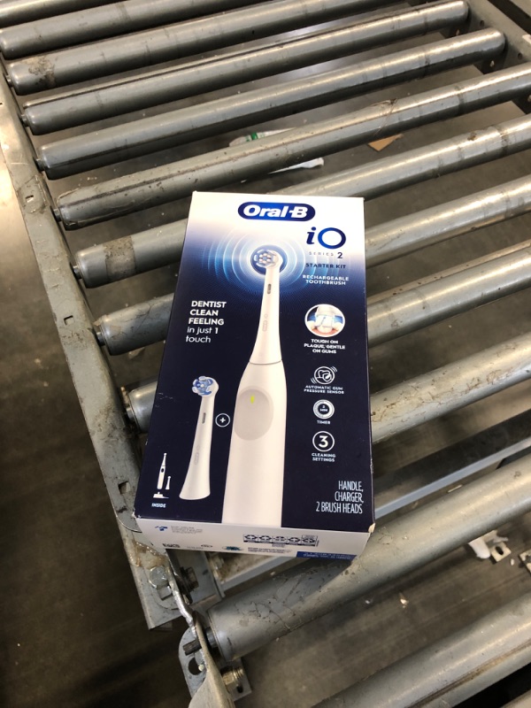 Photo 1 of  *** USED *** Oral-B iO Series 2 Rechargeable Electric Powered Toothbrush Starter Kit, Pure White with 2 Brush Heads - Automatic Pressure Sensor to Protect Gums - 3 Modes - 2 Min Timer