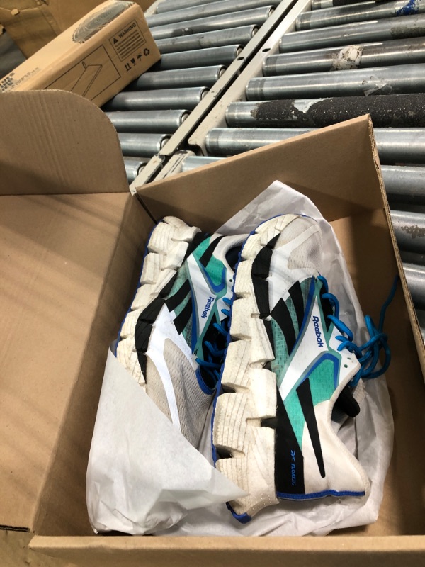 Photo 1 of **HEAVILY USED**Reebok Men's Floatzig 1 Sneaker, Footwear White/Black/Cyber Mint, 10.5