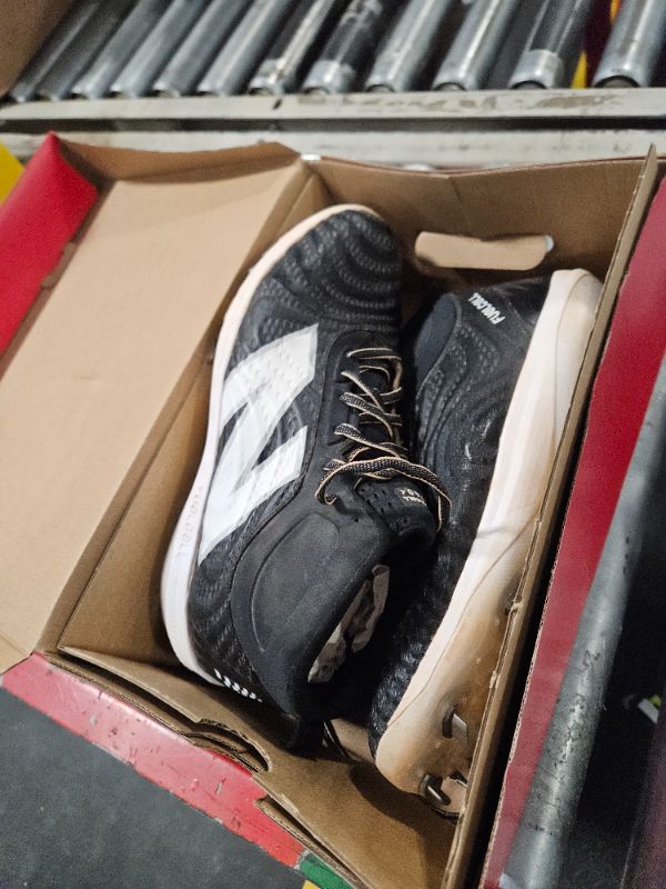 Photo 2 of **USED**
New Balance Men's FuelCell 4040 V7 Mid-Metal Baseball Shoe, Black/Optic White, 10.5 Wide