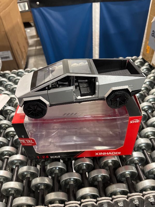Photo 1 of **MISSING DOOR**
Cybertruck Model: 1/24 Diecast Metal Toy Trucks with Lights and Sounds, Mini Vehicles Toys for Boys, Ages 3 and Up (Silver)