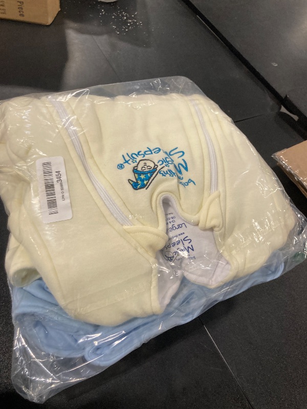 Photo 1 of Magic Sleepsuit Baby Merlin's Cotton Baby Transition Swaddle, Small (12-18 lbs) Cozy Sleep Sack, Soft Cotton Inner Layer, Double Zipper for Easy Diaper Changes, Cream & Blue 2 Pack