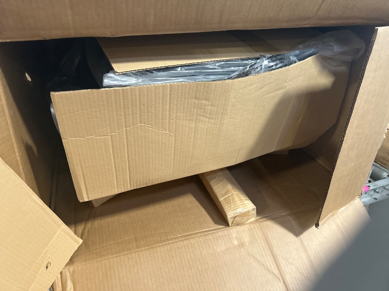 Photo 1 of Serta Claremont Ergonomic Executive Office Chair with Back in Motion Technology, Adjustable Mid Back Desk Chair with Lumbar Support, Bonded Leather, Black