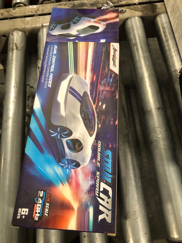 Photo 1 of AEROQUEST Gesture Sensing Remote Control Car, Drift RC Stunt Car with Light Spray & Sound, 2.4GHz Hobby RC Cars Toy for Kids, 360° Rotate, Birthday Gifts for Boys Girls 4-12
