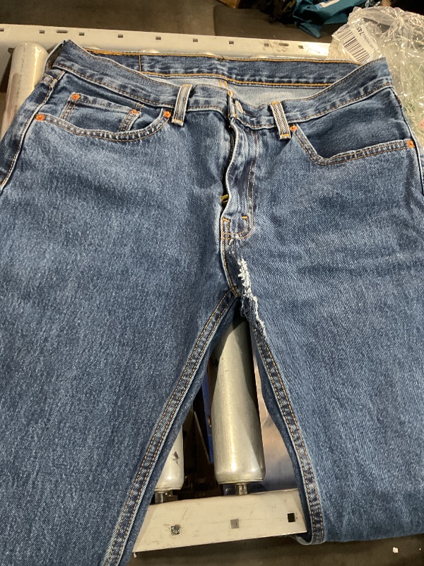 Photo 1 of ***(MAJOR DAMAGE/ SEE NOTES)***
Levi's Men's 501 Original Fit Jeans (Also Available in Big & Tall), Medium Stonewash, 33W x 30L