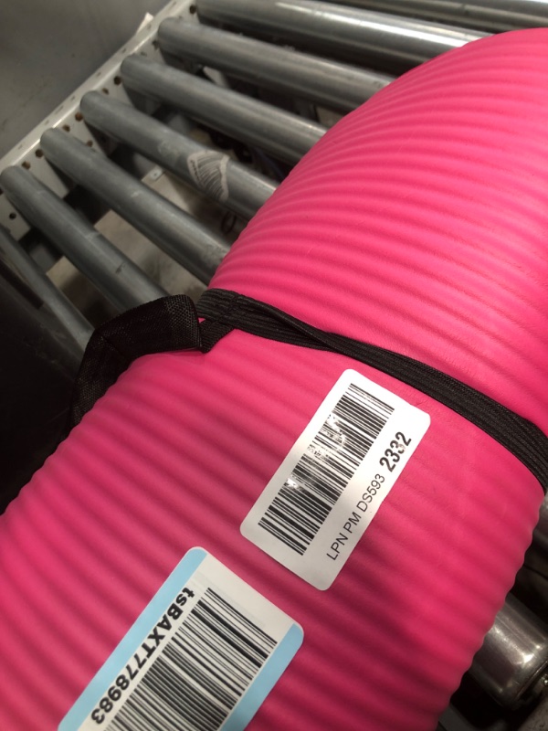 Photo 1 of Amazon Basics 1/2 Inch Extra Thick Exercise Yoga Mat with Carrying Strap, Pink