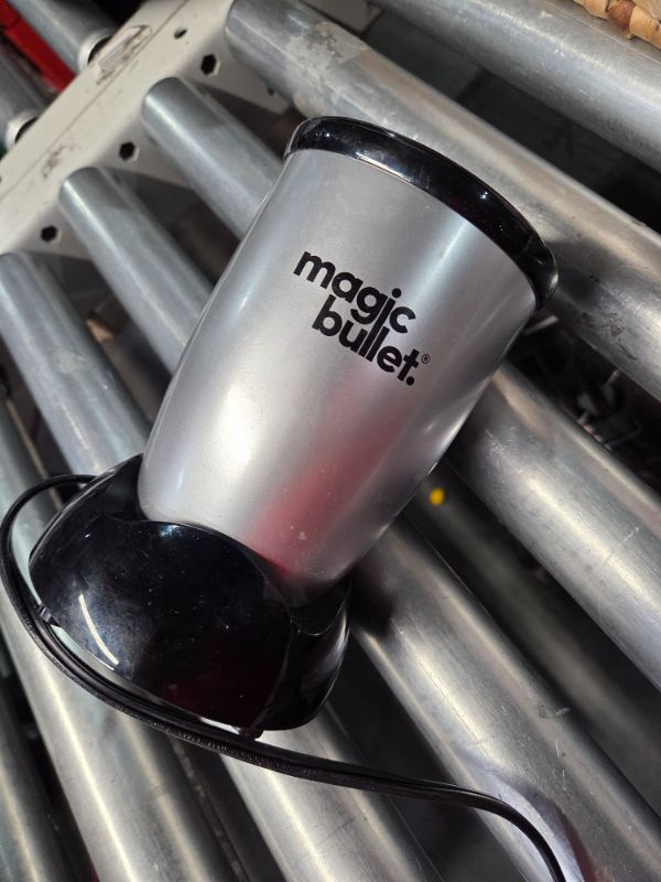 Photo 1 of ***BLENDER ONLY - MISSING CONTAINERS - SEE PICTURES - HEAVILY USED AND DIRTY - UNABLE TO TEST***
Magic Bullet Blender, Small, Silver