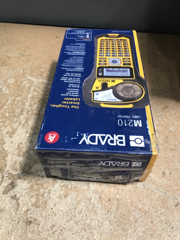 Photo 1 of Brady M210 Portable Label Printer with Rubber Bumpers, Multi-Line Print, 6 to 40 Point Font (Replaces BMP21-PLUS Printer), Yellow/Black, 9.5 in H x 4.5 in W x 2.5 in D