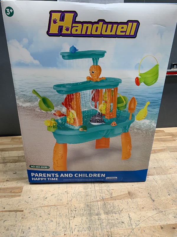 Photo 1 of Upgraded Toddler Water Table, 3-Tier Outdoor Kids Activity Table with Water Pump & Water Toy Accessories, Rain Showers Splash Pond Outside Water Play Toys Sand Sensory Table for Boys Girls Age 3+