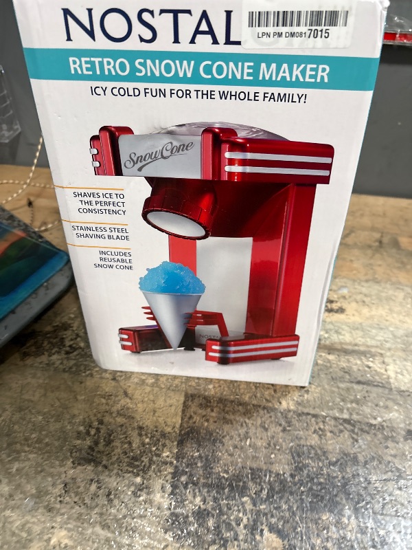 Photo 1 of Nostalgia Snow Cone Shaved Ice Machine - Makes 20 Icy Treats - Includes 1 Reusable Plastic Cup - Retro Red