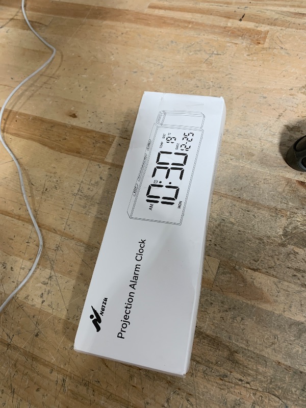 Photo 1 of Netzu Projection Clock for Bedroom Ceiling, Alarm Clocks with 180° Rotatable Projector, Date Temperature and Weekday, Manual DST, 5 Brightness, 10 Ringtones, 4 Volumes and Snooze (RGB)