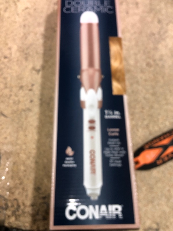 Photo 1 of Conair Double Ceramic 1 1/4-Inch Curling Iron, 1 ¼ inch barrel produces loose curls – for use on medium and long hair