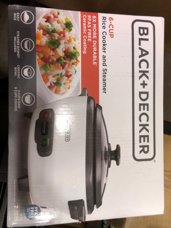 Photo 1 of BLACK+DECKER 6-Cup Rice Cooker, RC506, 3-cup Uncooked Rice, Steaming Basket, Removable Non-Stick Bowl, One Touch