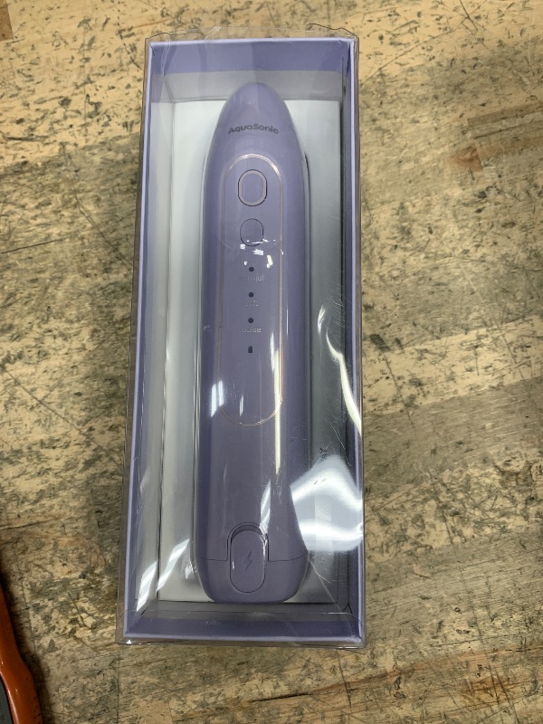 Photo 1 of AquaSonic Icon Water Flosser for Teeth – Cordless Rechargeable Oral Irrigator – Waterproof, Portable Dental Cleaning with Jet Tip – Braces Home Travel - Lilac