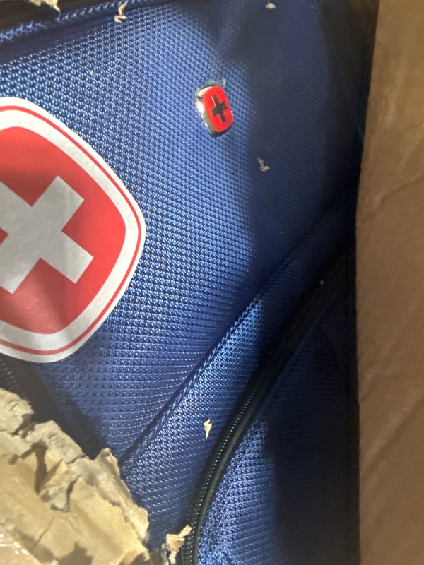 Photo 1 of SwissGear Sion Softside Expandable Luggage, Blue, Checked-Medium 25-Inch
***ONE BOTTOM CORNER DENTED IN, MAY BE ABLE TO BE FIXED WITH SOME HEAT FROM A HAIR DRYER.***