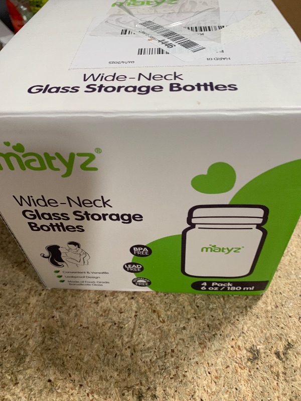 Photo 1 of Matyz Glass Breastmilk Storage Containers, 4 Pack, 6 oz Bottle, Fit with Spectra Medela Avent Pump - Wide Mouth Breastmilk Collection and Storage Bottle with Lids - No BPA (2 Green & 2 Blue Lids)
