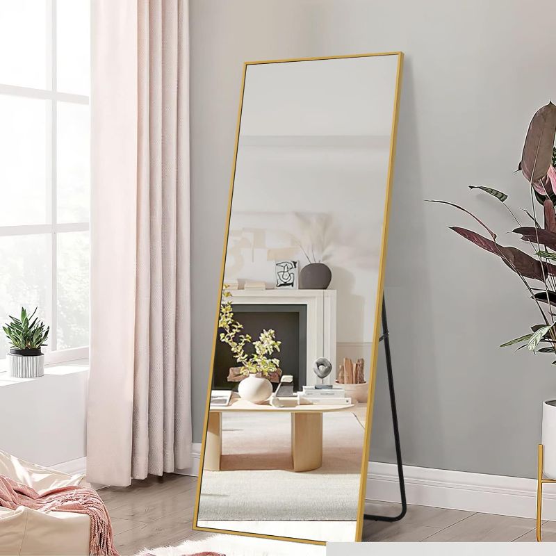 Photo 1 of  Full Length Mirror, 64"x21" Body Mirror with Stand Floor Standing Wall-Mounted Hanging or Leaning Against Wall Aluminum Alloy Thin Frame (Gold)
