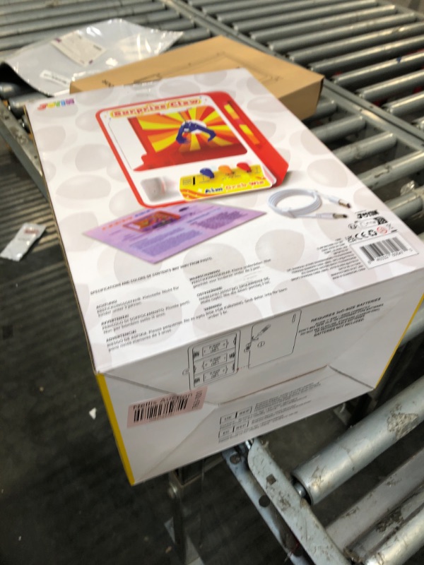 Photo 1 of JOYIN Claw Machine Arcade Toy with LED Light & Adjustable Sound, Rechargable Dispenser Toys Mini Vending Machine for Kids - Perfect Christmas & Birthday Big Gifts for Kids, Ages 3+