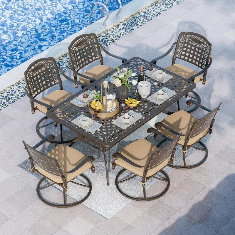 Photo 1 of Metal patio table and  6 chair set with beige pillows***STOCK IMAGE, SIMILAR ITEM/ COLOR MAY VARY***
