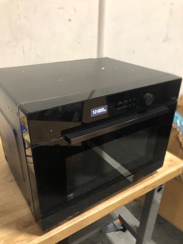Photo 1 of 1.2 cu. ft. Countertop Microwave with Power Convection in Black Glass
